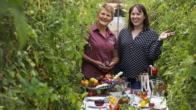 Founder of Off the Table Anna Yip (RHS) and co owner of Tasmanian Natural Garlic and Tomatoes Annette Reid at Selbourne. PICTURE CHRIS KIDD