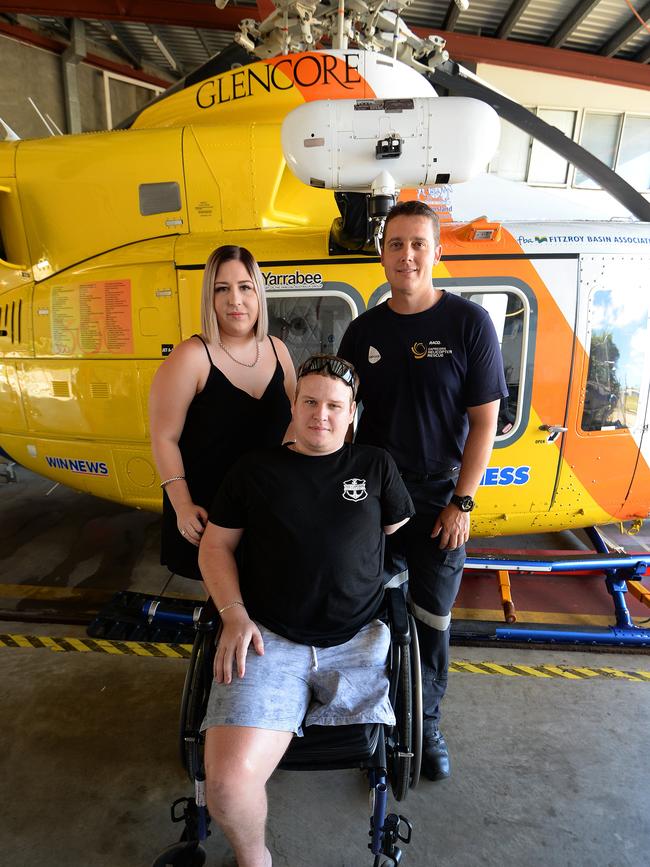 L-R Teneile Davis, Dayne Ladbrook and Nathan Triffett.   Dayne visited the RACQ Helicopter Rescue Service hangar to thank them for saving his life and also made a donation.   Nathan Triffett was one of the crew that responded to the Bajool crash back in 2014.