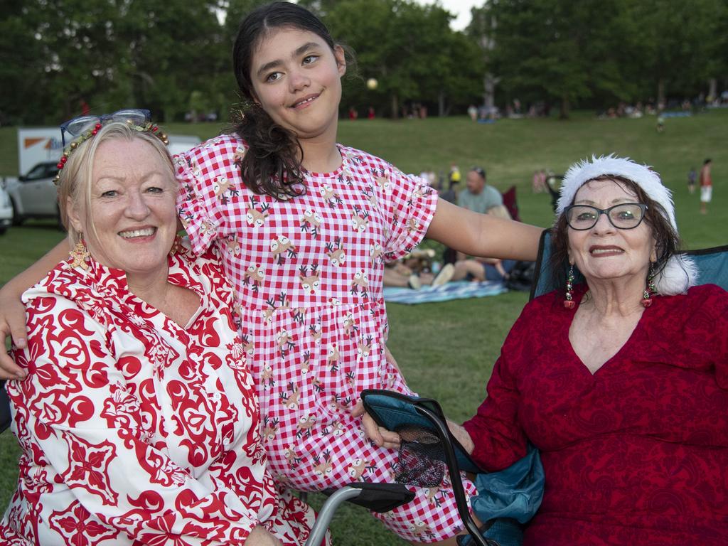 (from left) Tammy Selke, Sinead Selke and Priscilla Barrett. Triple M Mayoral Carols by Candlelight. Sunday 8th December, 2024. Picture: Nev Madsen.