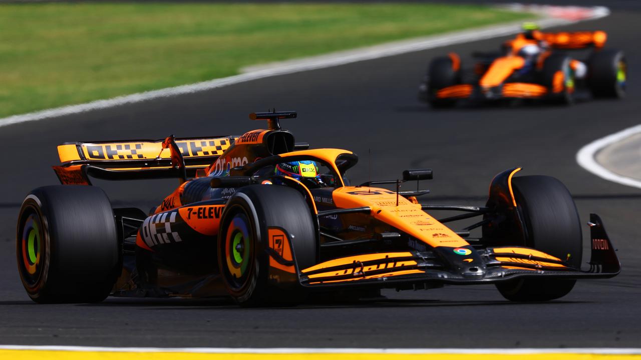 Oscar Piastri leads his McLaren teammate Lando Norris but had to reclaim the lead after a pit stop. Picture: Mark Thompson/Getty Images