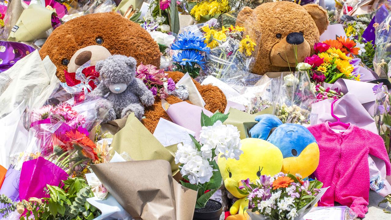 Flowers for Kate Leadbetter and Matty Field at the intersection of Vienna and Finucane roads at Alexandra Hills. Picture: Richard Walker