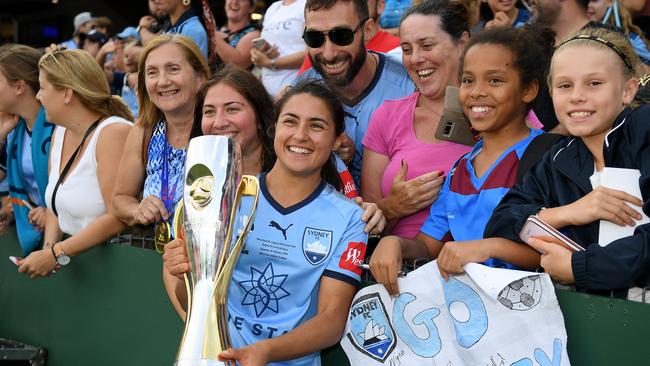 Sydney FC’s Teresa Polias poses for photographs with supporters following her team’s win over Perth Glory in the W-League grand final. Picture: AAP