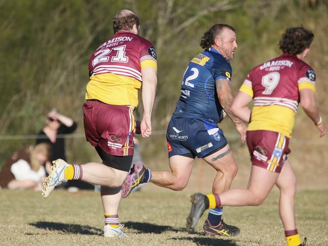 Logan Page (No.21) sets off after Brothers backrower Brendan Randall. Picture Warren Gannon Photography