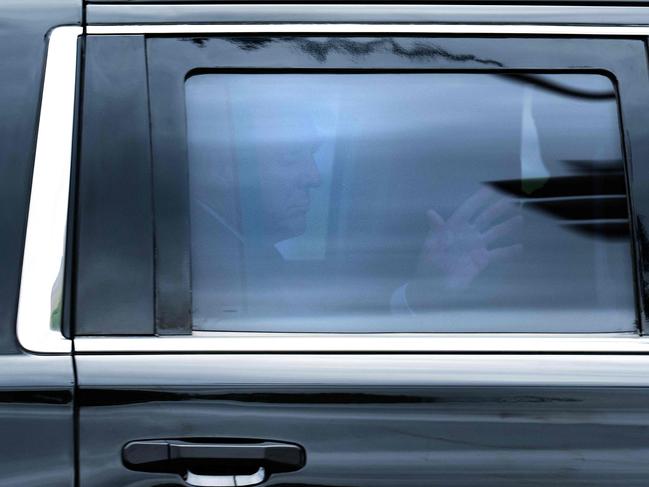 Trump waves to supporters on his way to the E. Barrett Prettyman US Courthouse in Washington, DC. Picture: AFP