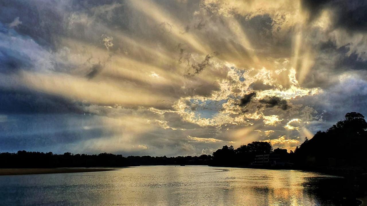 Sun bursting through the clouds at Nambucca Heads snapped by Bronwyn Hawkes.