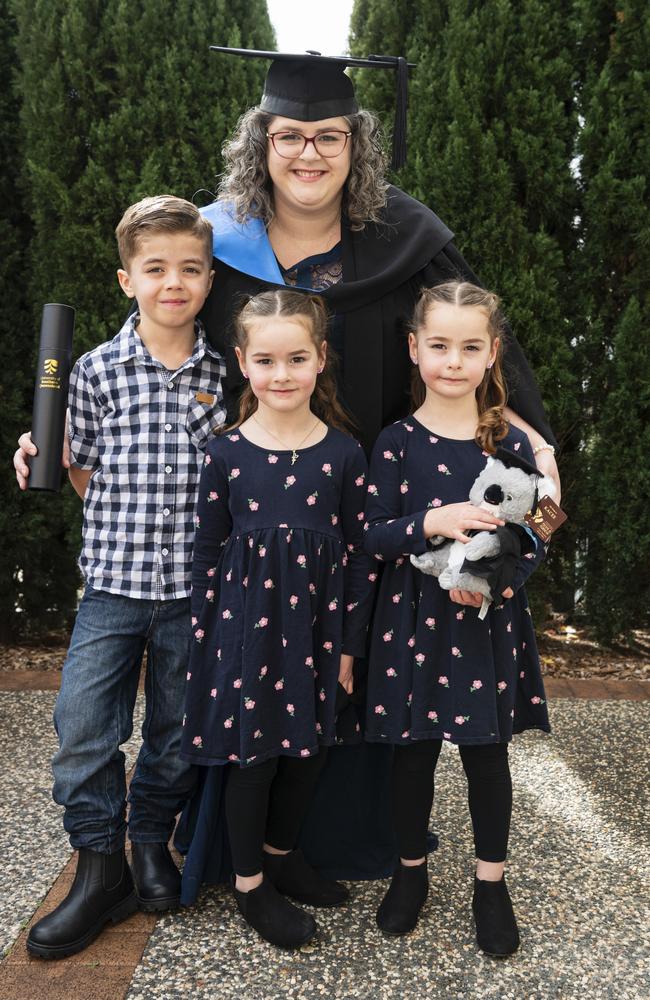 Bachelor of Nursing (Distinction) graduate and Faculty Medal recipient Kaylee Fitzsimmons with her kids Riley, Mackenzie (centre) and Madison Fitzsimmons UniSQ graduation ceremony at The Empire, Tuesday, June 25, 2024. Picture: Kevin Farmer