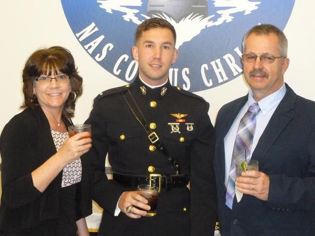 US Marine Corp Captain Benjamin Robert Cross, 26, of Oxford, Maine, with his parents, mum Valerie and Dad Robert Cross. Photo: Supplied.