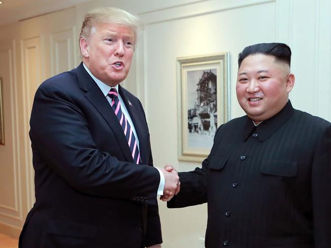 US President Donald Trump shake hands in Hanoi as they meet ahead of their summit. Picture: AFP 