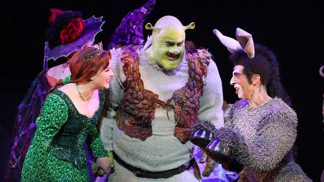 Lucy Durack as Princess Fiona, Ben Mingay as Shrek and Nat Jobe as Donkey in Shrek The Musical. (AAP Image/David Crosling)