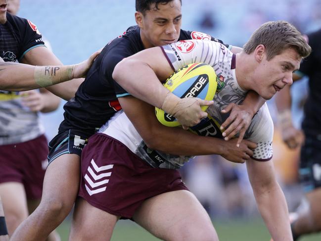 Manly (maroon/white) versus Penrith (black) under 20s semi final. Penrith won the match 44-24.