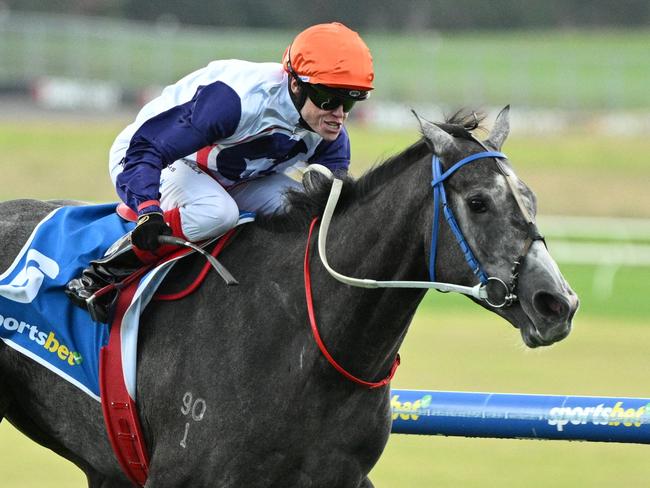 MELBOURNE, AUSTRALIA - APRIL 21: Craig Williams riding Figlio  D'Argento winning Race 3 during Melbourne Racing at Sandown Racecourse on April 21, 2025 in Melbourne, Australia. (Photo by Vince Caligiuri/Getty Images)