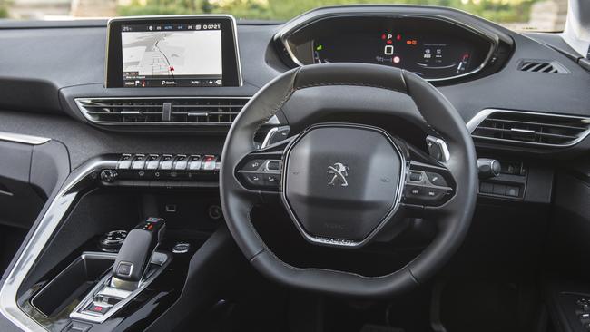 The 5008 has Peugeot’s signature small steering wheel; it’s great around town but makes the car feel too nervous and direct at highway speeds. Picture: Supplied.