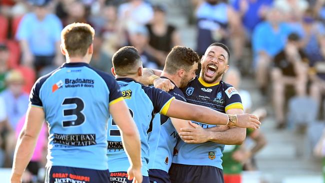 BRISBANE, AUSTRALIA - OCTOBER 10: The Devils players celebrate victory after the 2021 QRL Intrust Super Cup Grand Final match between the Norths Devils and the Wynnum-Manly Seagulls at Moreton Daily Stadium on October 10, 2021, in Brisbane, Australia. (Photo by Bradley Kanaris/Getty Images)