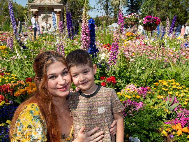 Michaela Cody and her son Raphael Kerr in Botanic Gardens, Queens Park during the Carnival of Flowers, Sunday, September 22, 2024. Picture: Bev Lacey