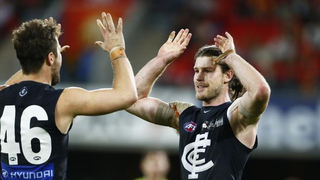 Bryce Gibbs celebrates a goal against the Suns. Picture: Jason O'Brien/AFL Media