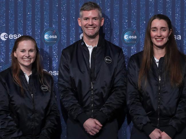 ESA Astronaut Class of 2022 Meganne Christian (L), John McFall (C), and Rosemary Coogan (R) pose during a ceremony to unveil the European Space Agency new class of career astronauts in Paris on November 23, 2022. - ESA choose two women and three men from five different Western European countries out of more than 22,500 applicants. (Photo by JoÃ«l SAGET / AFP)