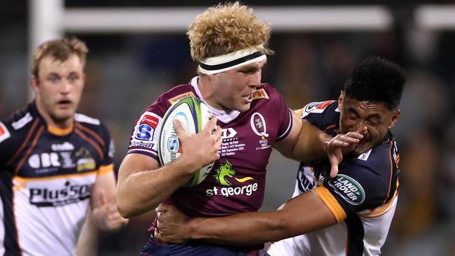 Angus Scott-Young pushing through a tackle. Picture: Getty Images