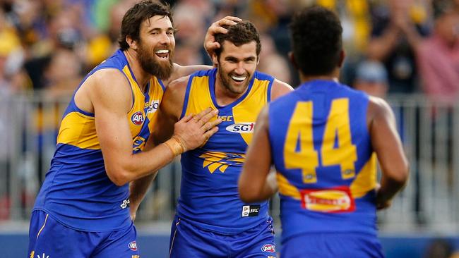 Josh Kennedy and Jack Darling celebrate a goal.