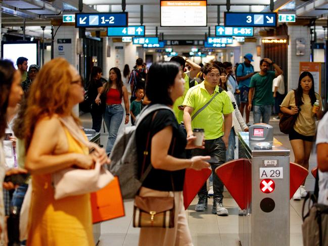 SPeople leave Town Hall Station in Sydney after the rail network closed on Wednesday afternoon. Picture: Nikki Short