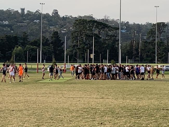 Mt Eliza fans mob Redlegs players after the thrilling finish.