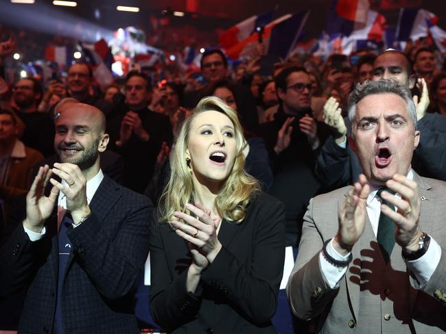 French far right party "Reconquete!" Vice-President and head of the Reconquete! party list for the European elections Marion Marechal (C) and French Senator Stephane Ravier (R) applaud a speechduring the European election campaign launch meeting of the far right Reconquete party at Le Dome de Paris - Palais des Sports in Paris on March 10, 2024. (Photo by EMMANUEL DUNAND / AFP)