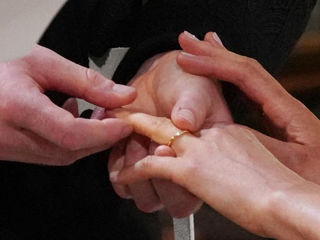 Exchanging rings. Picture: AFP