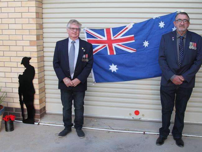 Ceduna identities Jimmy Spry and David Walker conducting their own Dawn Service in Jimmy’s driveway. Picture: Andrew brooks