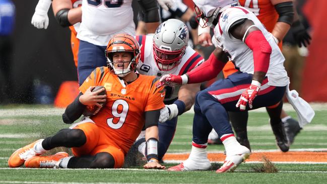 Joe Burrow of the Cincinnati Bengals slides with the ball in the second quarter of the game against the New England Patriots in Week 1. Pic: Dylan Buell/Getty Images