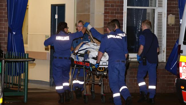 One of the victims of the shooting is taken into RPA Hospital.