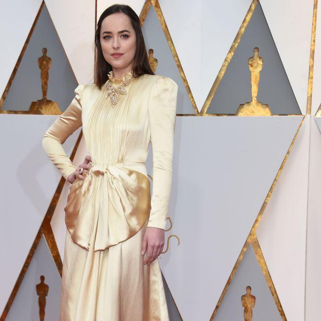 US actress Dakota Johnson arrives on the red carpet for the 89th Oscars on February 26, 2017 in Hollywood, California.  Picture: AFP PHOTO / VALERIE MACON