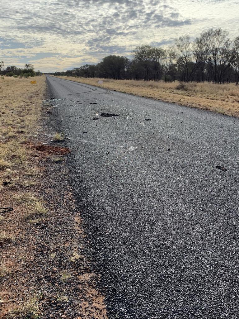 Debris left on the road at the crash near Hermannsburg. Picture: Joshua Clements