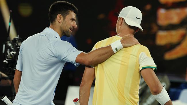 Novak Djokovic congratulates his opponent Dino Prizmic after three 4 set 4 hour match . Pic: Michael Klein