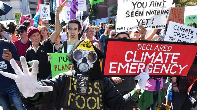 Dozens of people were arrested during a day of protests in Brisbane’s CBD on August 6. Picture: Darren England/AAP