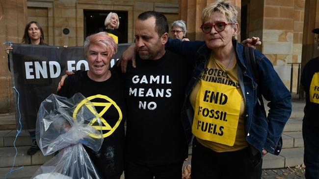 Extinction Rebellion activists Sarah Edwards, Bradley Homewood and Heinke Weber outside court on Friday after being sentenced. Picture: NCA NewsWire/ Naomi Jellicoe.