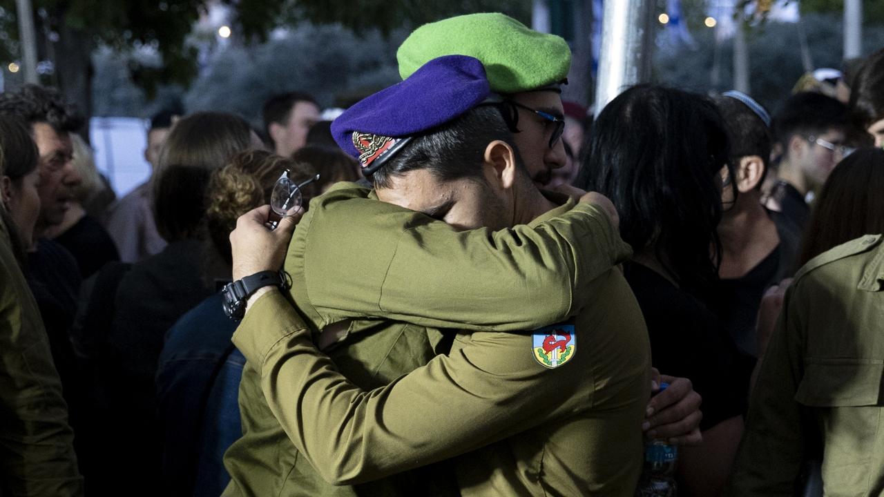 Heartbreaking moment as fallen soldier mourned