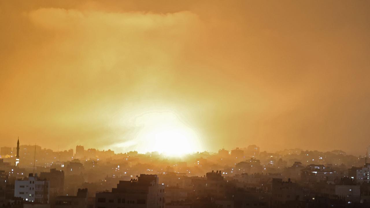 An explosion lights the sky following an Israeli air strike on Beit Lahia in the northern Gaza Strip. Picture: Mohammed Abed/AFP