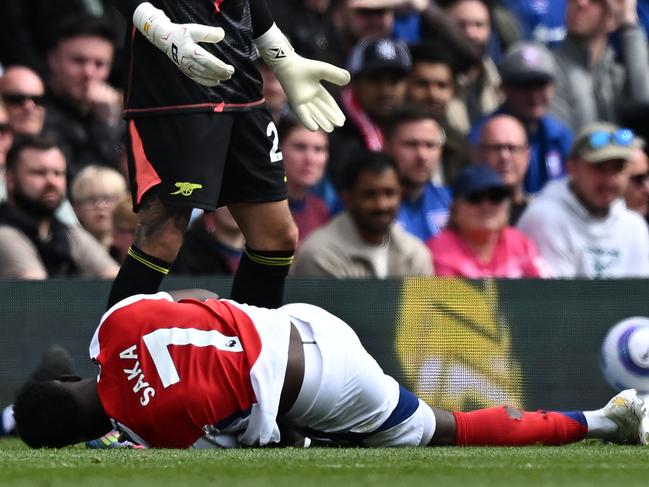 Bukayo Saka suffered a nasty tackle from Leif Davis. Picture: Ben Stansall/AFP