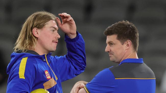 MELBOURNE, AUSTRALIA - APRIL 27: Harley Reid and Andrew McQualter, Senior Coach of the Eagles during the 2025 AFL Round 07 match between the Hawthorn Hawks and the West Coast Eagles at Marvel Stadium on April 27, 2025 in Melbourne, Australia. (Photo by James Wiltshire/AFL Photos via Getty Images)