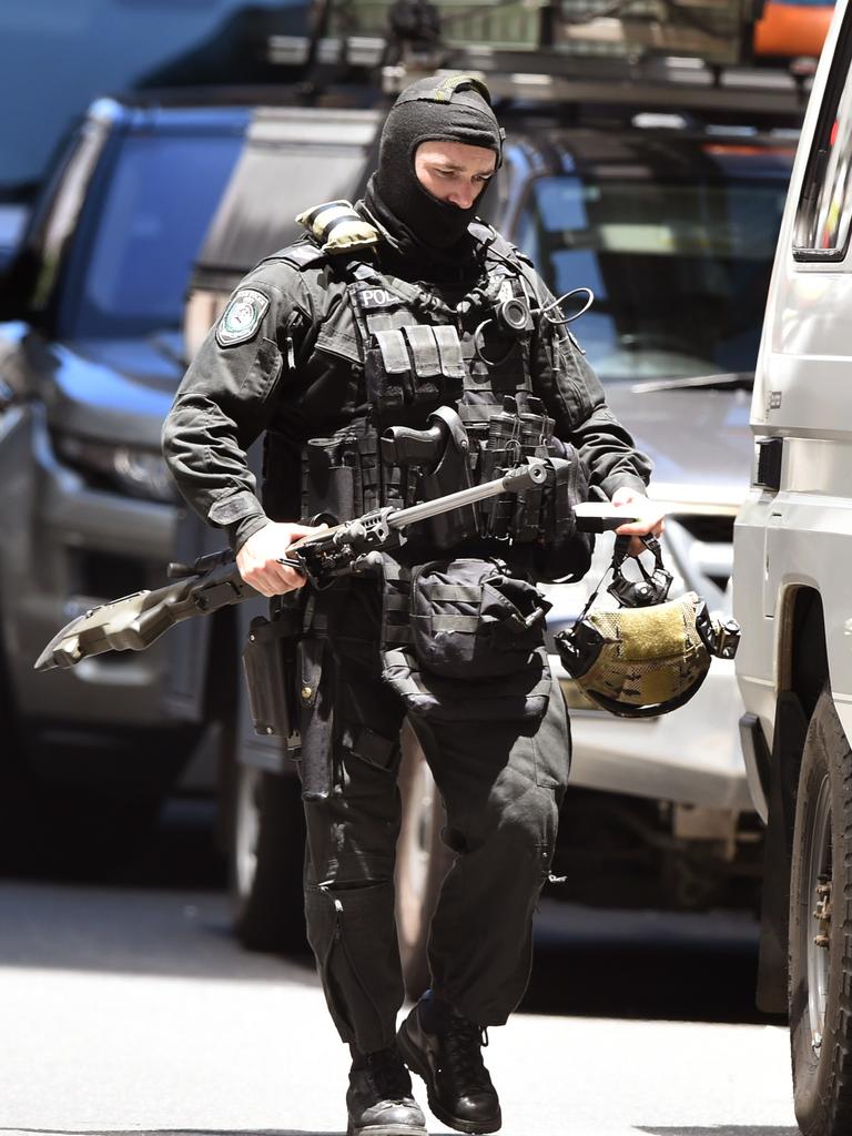 A police sniper during the hostage siege. Picture: William West (AFP)