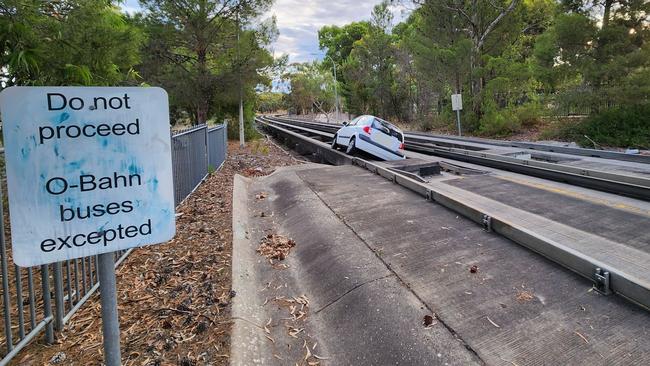 The hatchback on the O-Bahn busway near the Tea Tree Plaza interchange. Picture: SA Police