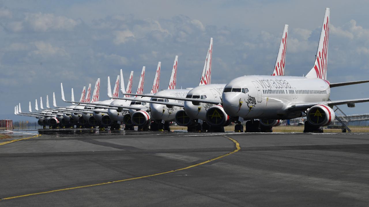 Grounded Virgin aircraft parked at Brisbane Airport. Picture: Darren England/AAP