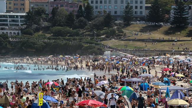 Bondi Beach in Sydney’s eastern suburbs saw a record 25,000 people on the sand on Monday. Picture: NCA Newswire / Gaye Gerard