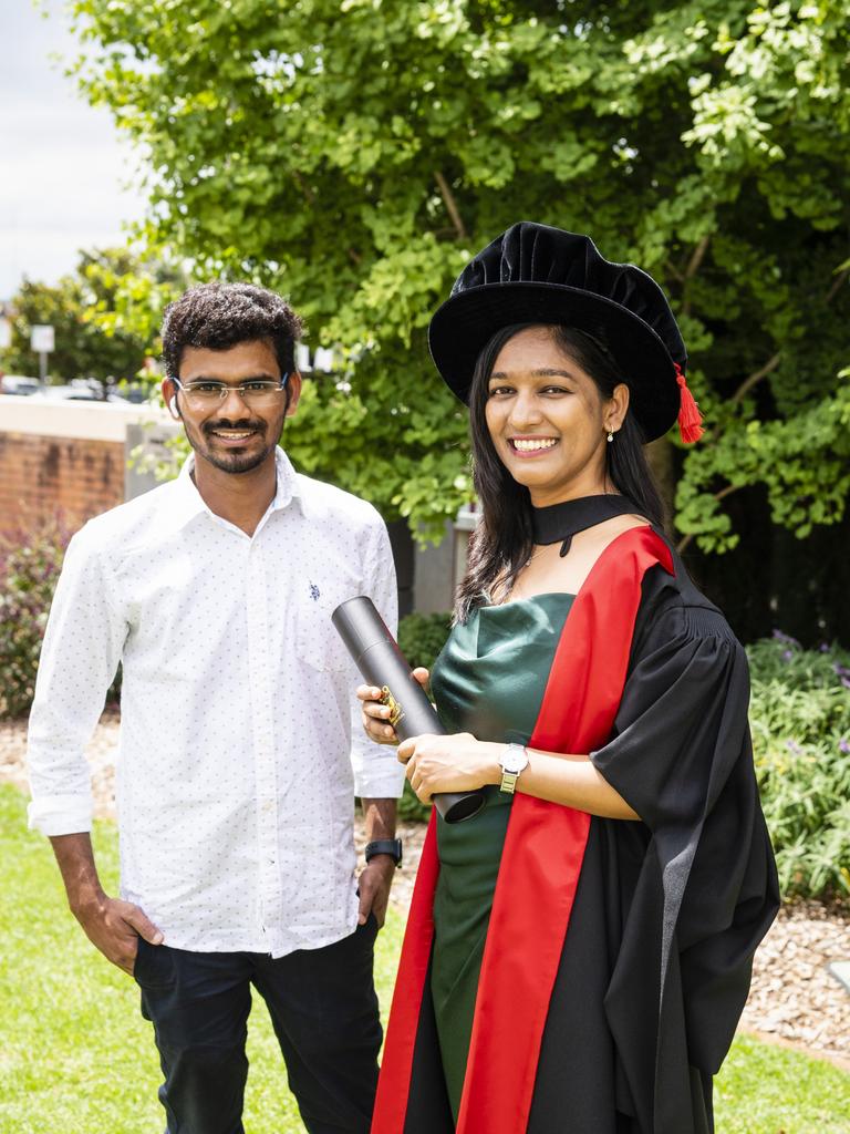 PhD graduate (agricultural biotechnology) Sonal Channale is congratulated by Naveen Naik at the UniSQ graduation ceremony at Empire Theatres, Tuesday, December 13, 2022.