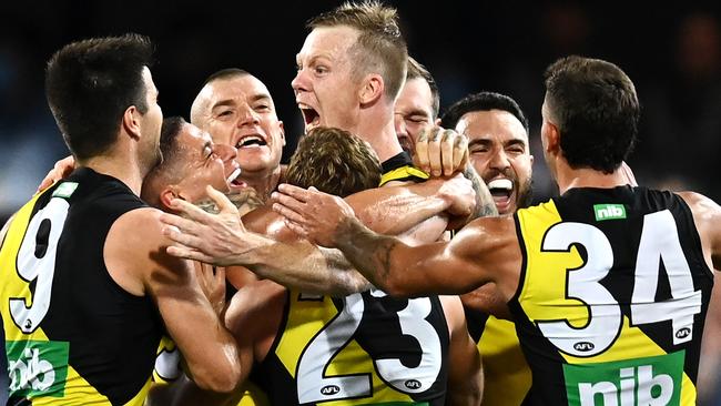 It is unclear whether AFL players — like premiers Richmond — will get a COVID vaccine before the season starts. Picture: Getty Images