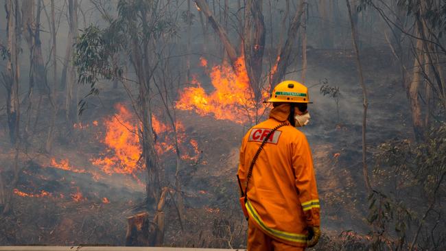 Thunderstorms could cause lightning and flash flooding, which will hamper firefighters. Picture: Jason Edwards