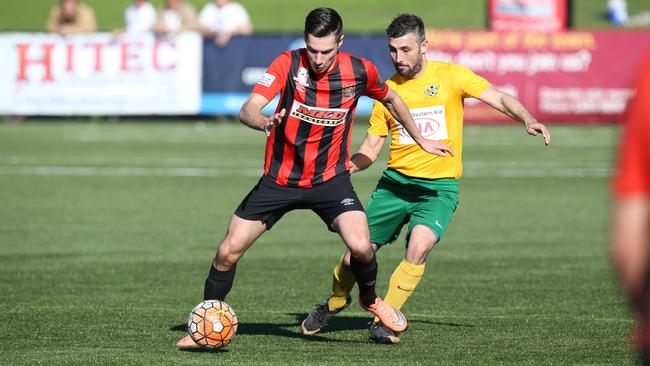 Mt Druitt Town Rangers (gold and green) versus Bankstown at Lily's Stadium. Picture: David Swift.