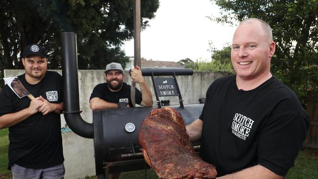 Brad Johnston, Nick Cooper and Chad Andrew from Scotch &amp; Smoke BBQ team pictured at Collaroy with their smoker ahead of the Meatsock Festival this weekend. Picture: David Swift.