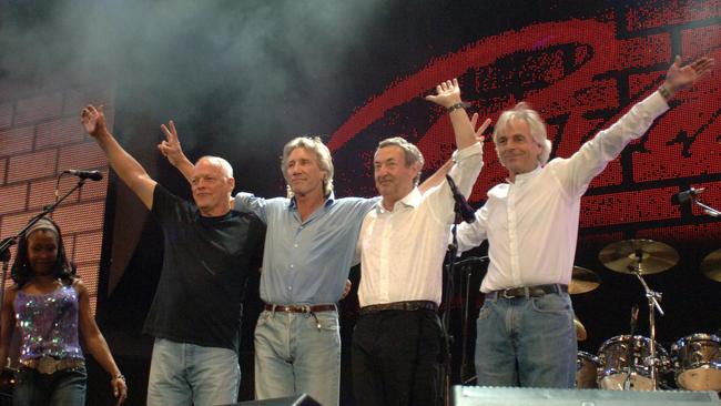 The members of Pink Floyd (L-R) Dave Gilmour, Roger Waters, Nick Mason and Rick Wright, after performing on stage together for the first time in 24 years at the Live 8 concert in Hyde Park, London in 2005.  Picture: AFP