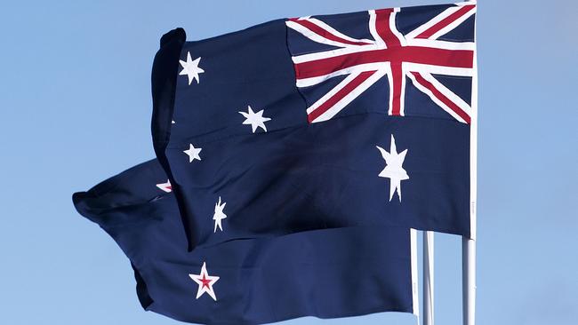 The Australian (right) and New Zealand flags fly together. Prime Minister Anthony Albanese said the countries had a “deep friendship” forged on common values and outlook. Picture: Marty Melville/AFP