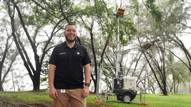 Councillor Brodie Phillips with amber light tower at Saunders Beach, designed to help turtles make their way to the ocean. Picture: Supplied